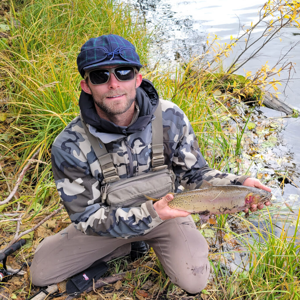 Made Like You Blog - Casey Gorsett with a trout next to a river