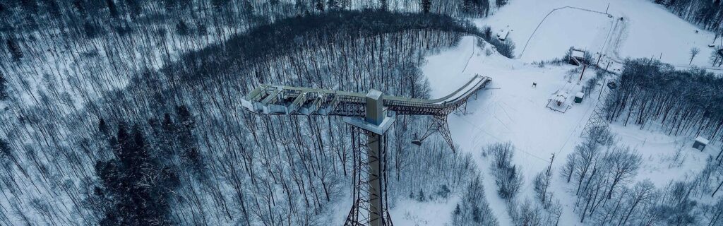 an overhead view of Copper Peak ski jump during the winter months with snow on the ground